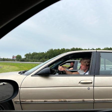 Dante Amadeo Meloni racing cars with his father and sister.